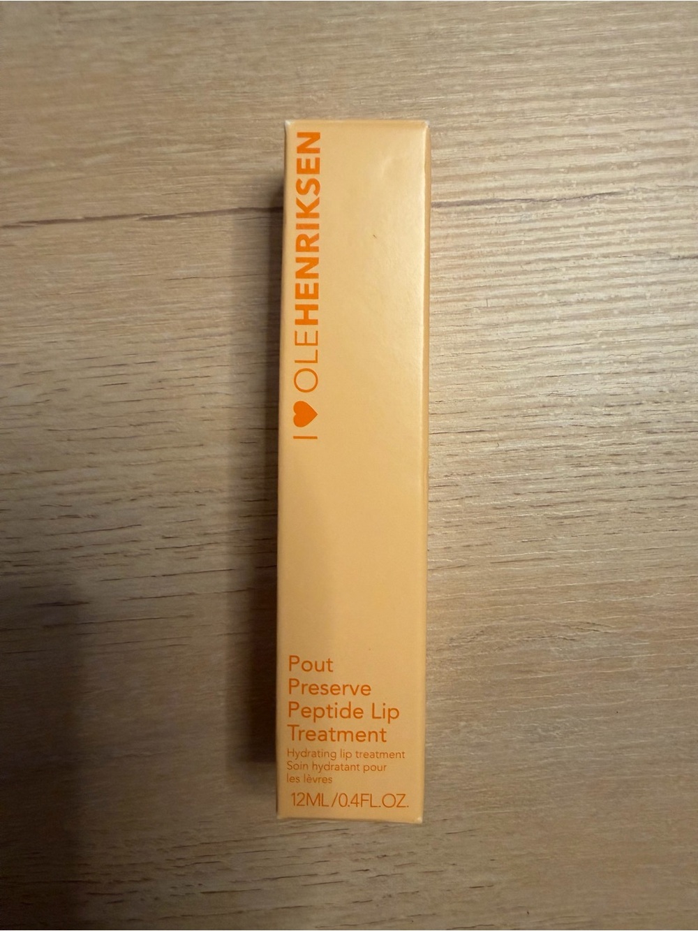 Ole Henriksen Peach-Orange Pout Preserve Peptide Lip Treatment